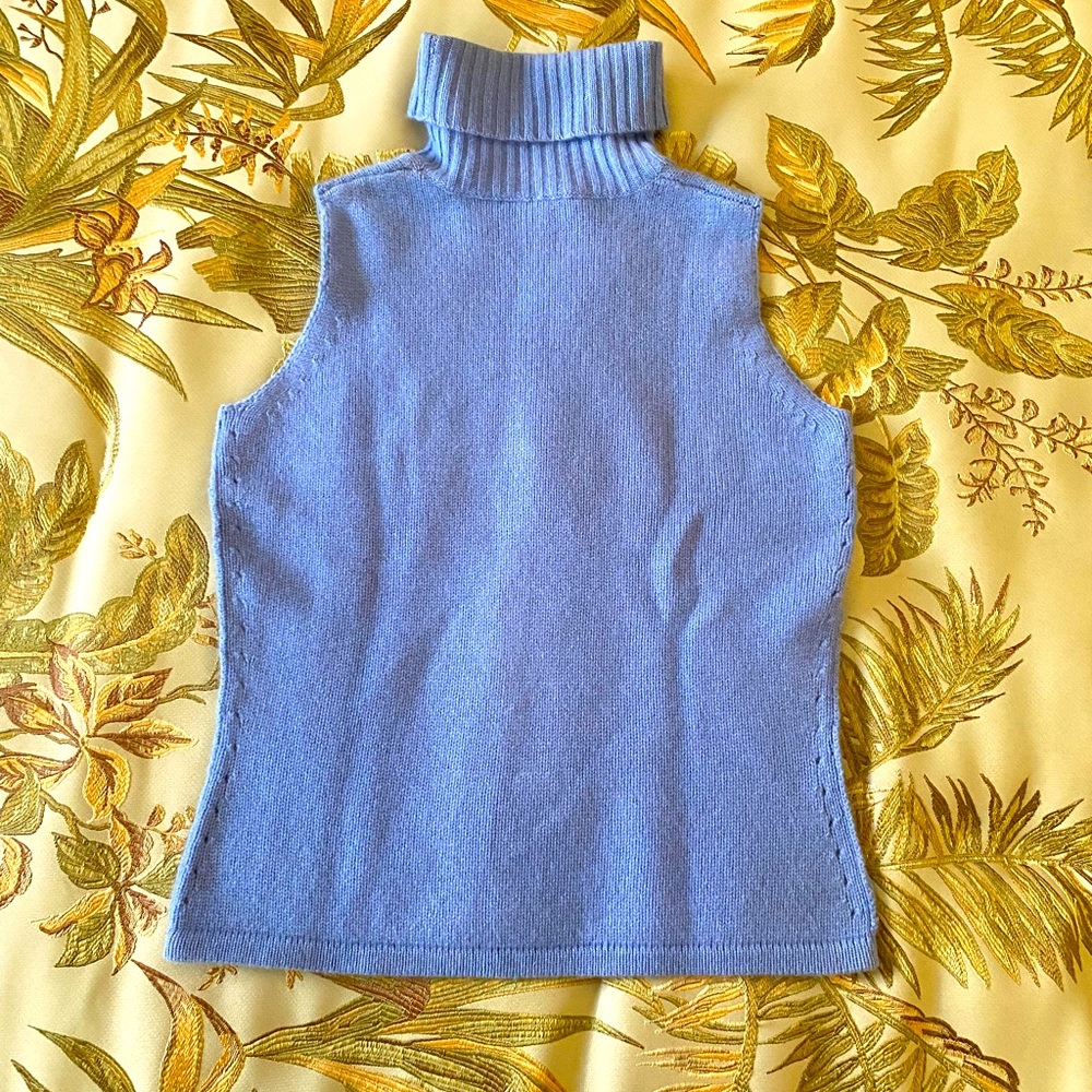 Lady’s Turtleneck cashmere sleeveless sweater.